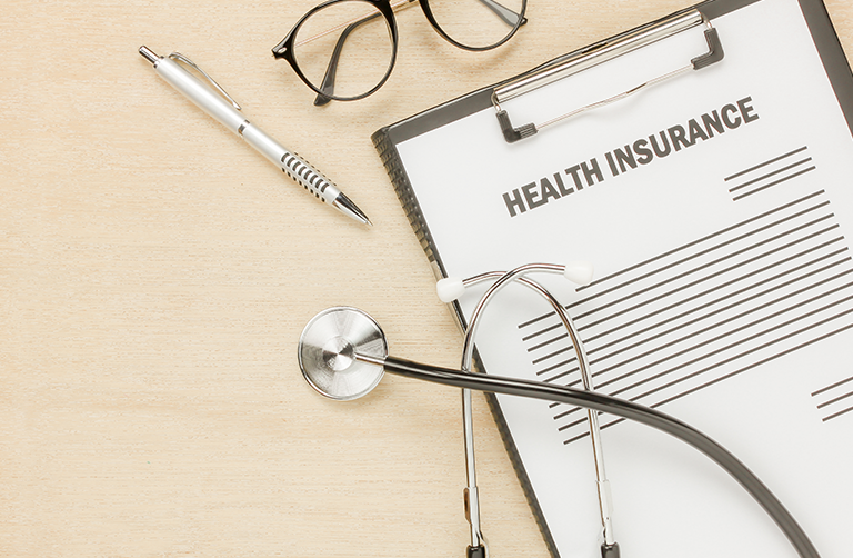 Team discussing group medical insurance benefits